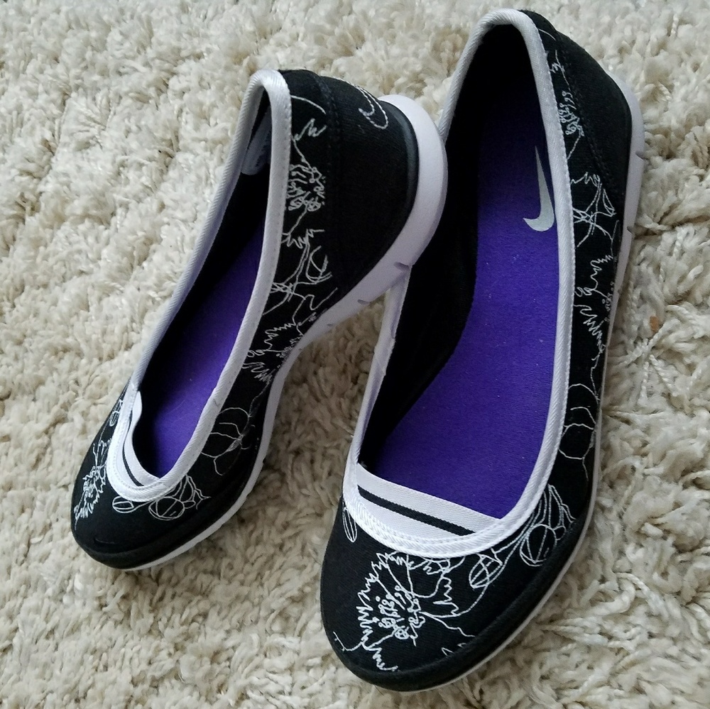 Nike casual slip on shoes. Black with white. NWOT